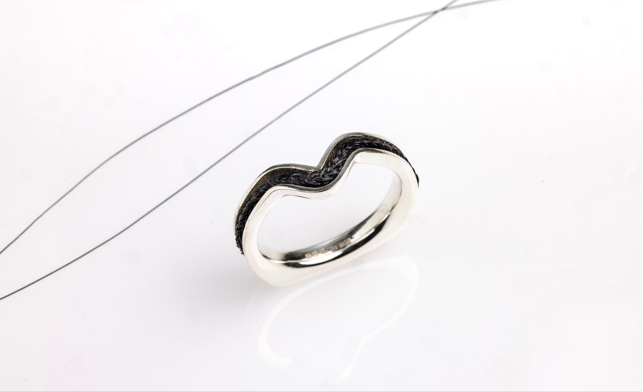 Quintessentially Equine Wishbone Ring in sterling silver with black braided horse hair inlay.