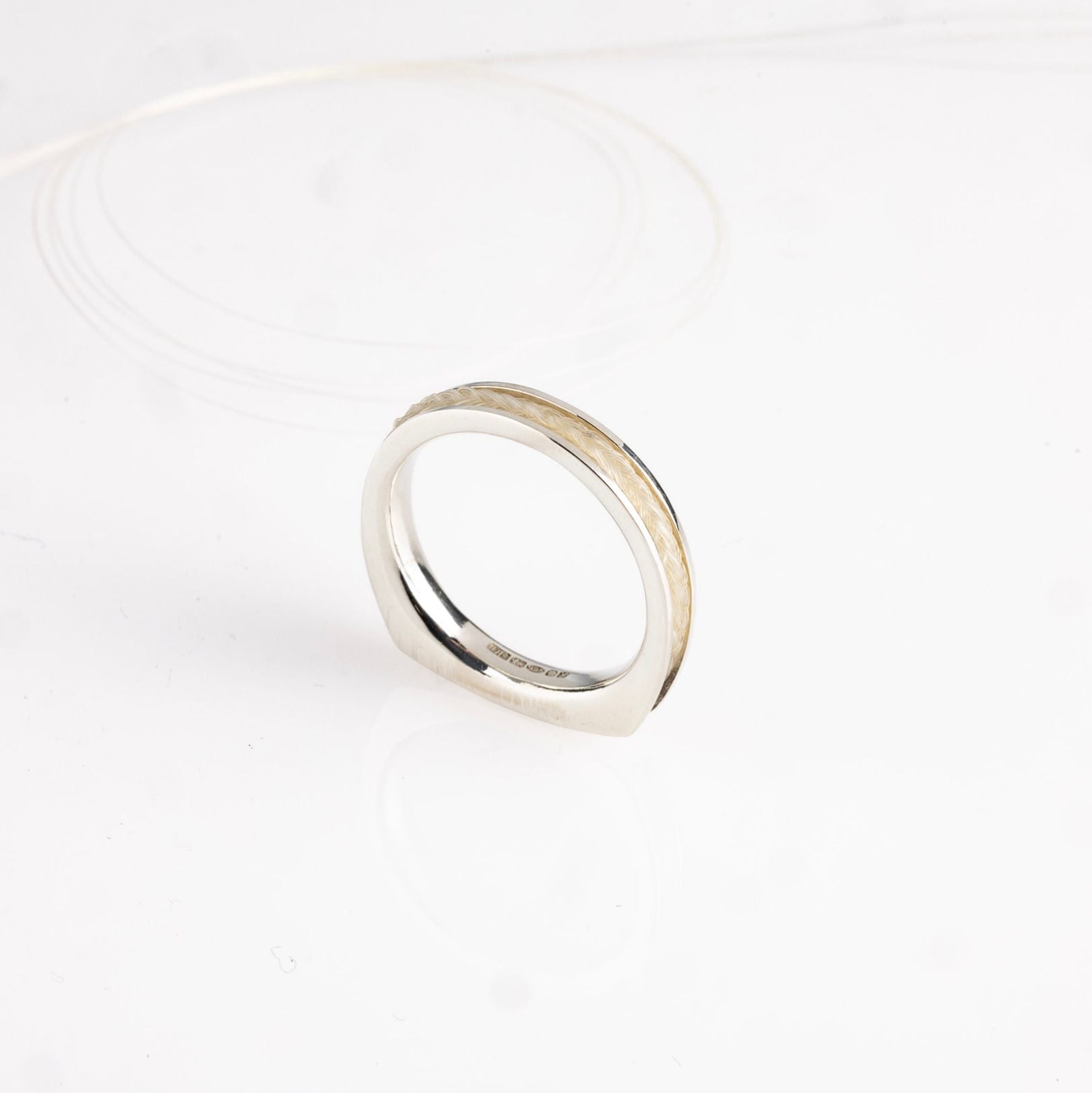 Quintessentially Equine Dash Ring in sterling silver with pale braided horse hair inlay.